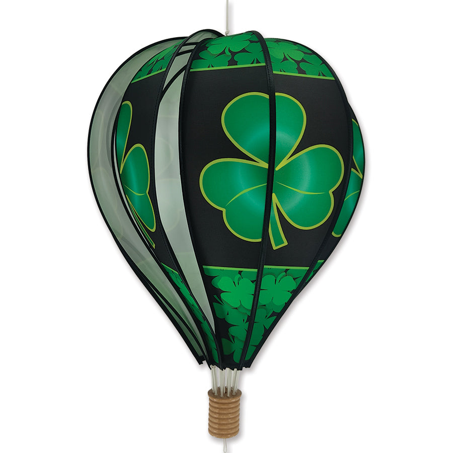 22 in. Hot Air Balloon featuring shamrocks, spinning delightfully in an outdoor garden setting with vibrant colors.
