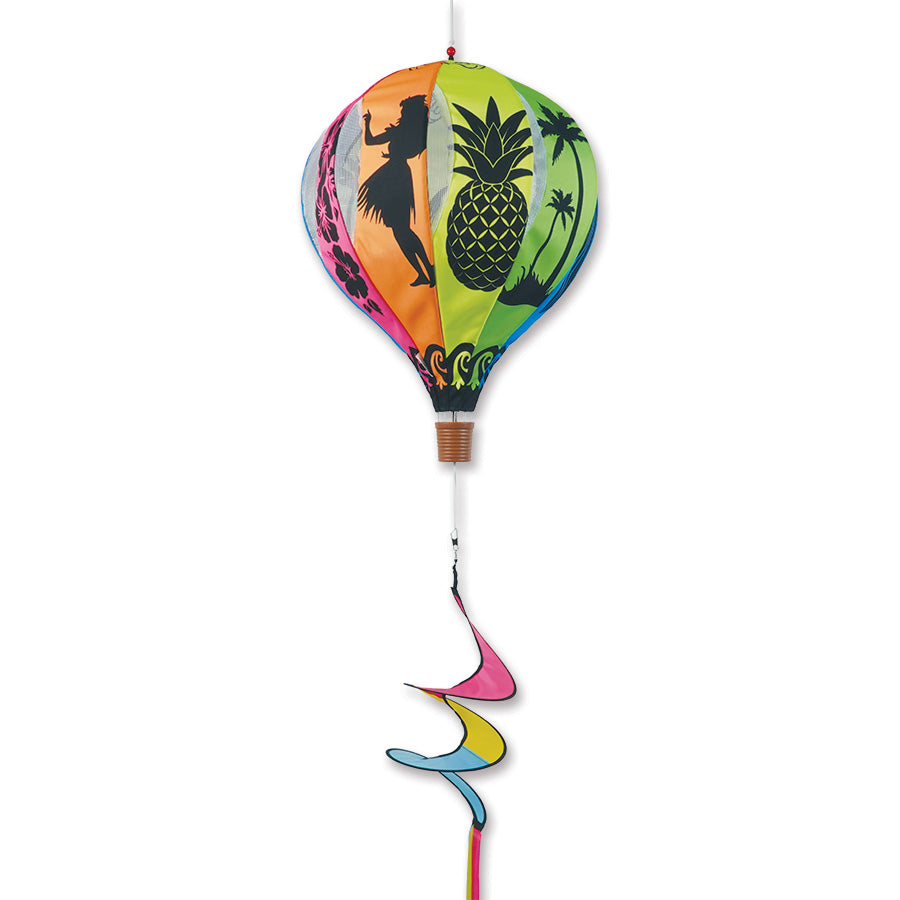 22 in. Pop-Open Hot Air Balloon with Hawaiian print, spinning gracefully on a patio in a colorful outdoor setting.