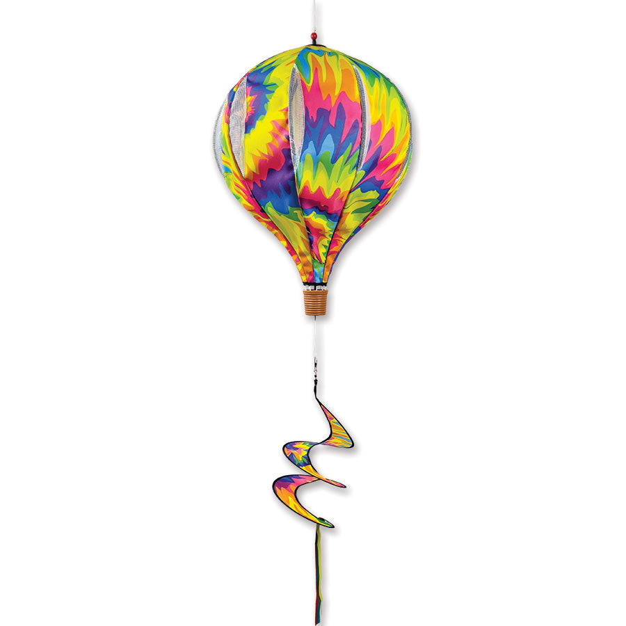 22 in. Pop-Open Hot Air Balloon in vibrant Tie Dye colors displayed outdoors, spinning gracefully in the wind, showcasing its unique design.