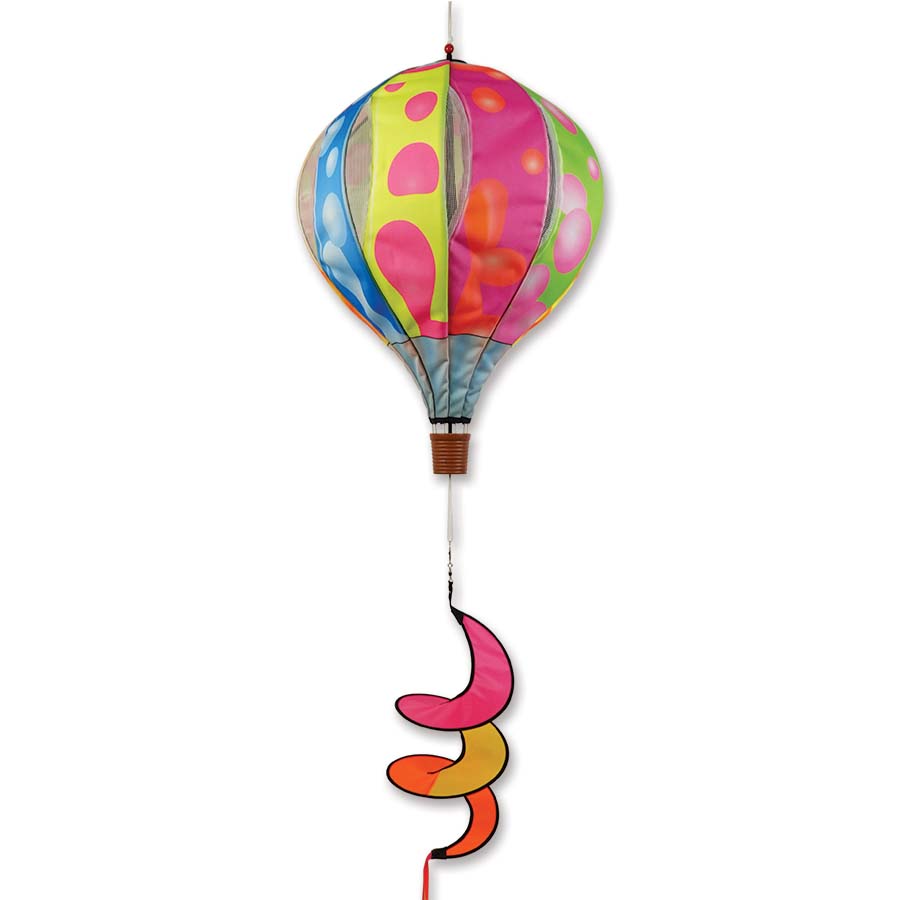 22 in. Pop-Open Hot Air Balloon wind spinner featuring colorful fabric, displayed gracefully spinning on a porch.