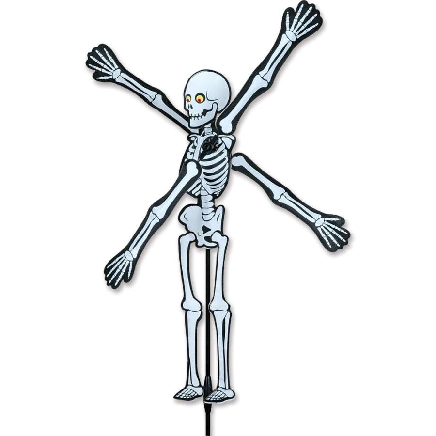 Vibrant 22 in. WhirliGig Spinner featuring a whimsical skeleton design, spinning gracefully in an outdoor garden setting.