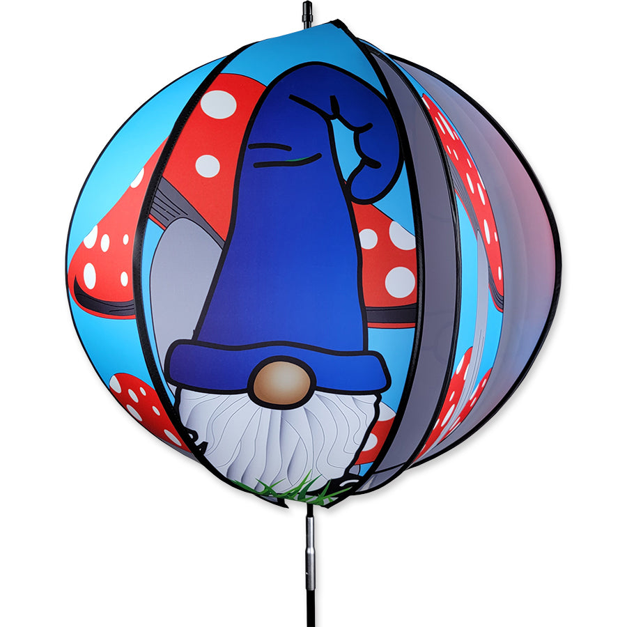 24 in. Ball Spinner featuring gnomes and mushrooms, colorfully designed panels spinning in a garden setting with a ground stake.