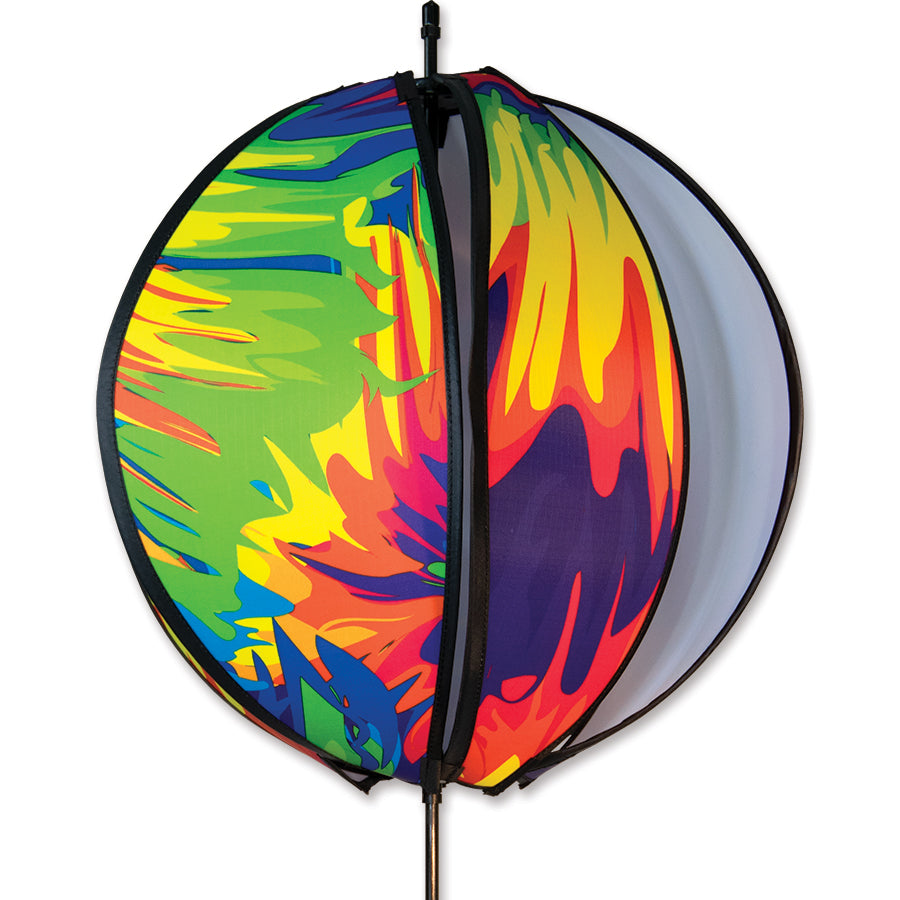24 in. Ball Spinner with colorful tie dye panels displayed outdoors on a garden stake, spinning gently in the breeze.