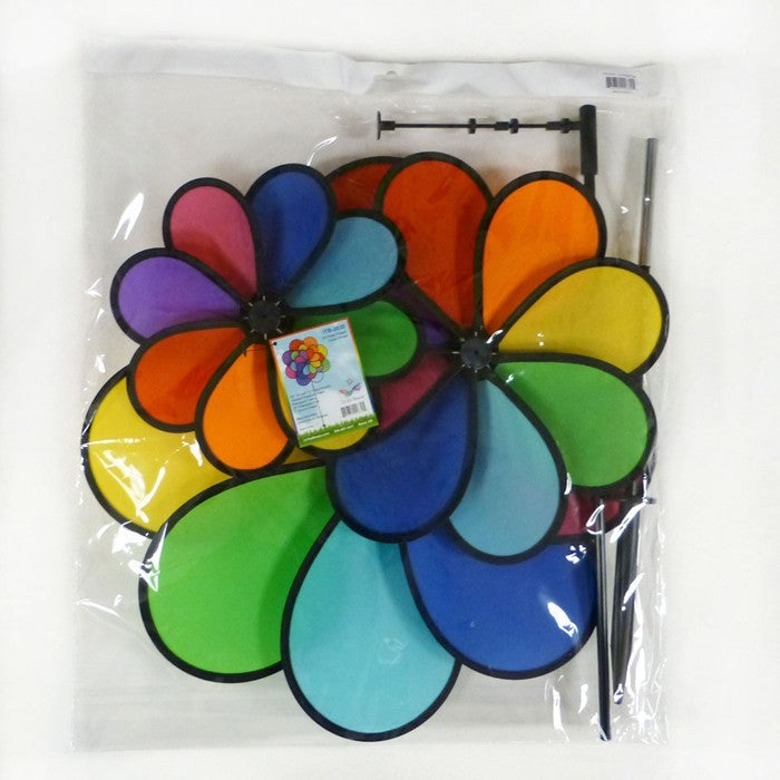 24-Petal Flower Triple Wheel Spinner featuring vibrant rainbow-colored petals spinning in a garden setting, creating a playful decoration.