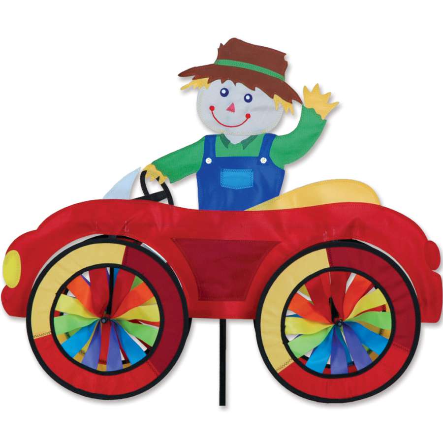 25 in. Car Spinner featuring an adorable scarecrow driving a colorful car, spinning cheerfully in a garden setting.