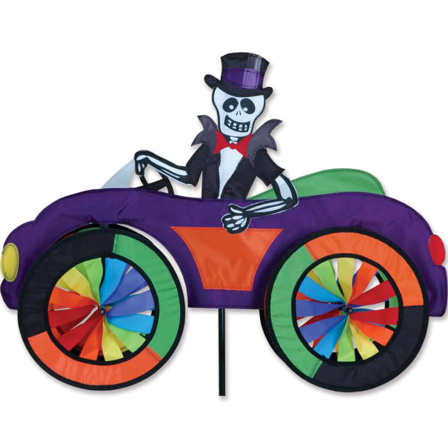 Colorful 25 in. Car Spinner - Skeleton spinning in the garden, featuring vibrant panel-rimmed wheels and a delightful skeleton design.