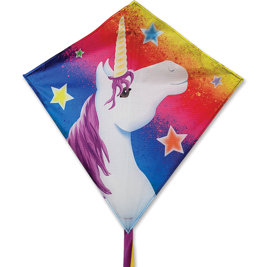 25 in. Diamond Kite featuring a Unicorn and Lucky Stars design soaring against a clear blue sky during an outdoor event.
