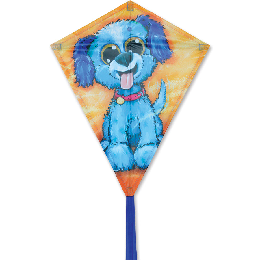 25-inch Diamond Kite in Happy Puppy design soaring high against a blue sky, framed with a sturdy fiberglass structure, ideal for outdoor fun.
