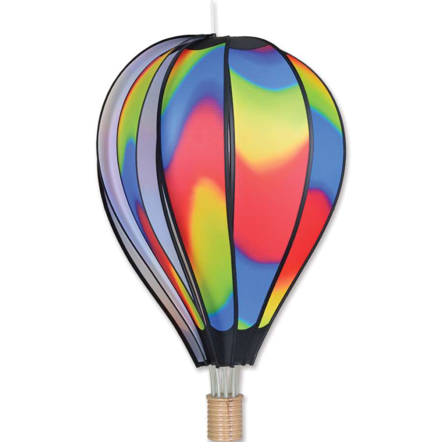Colorful 26 in. Hot Air Balloon - Wavy Gradient spinning in an outdoor garden setting, showcasing its vibrant hues and cheerful design.