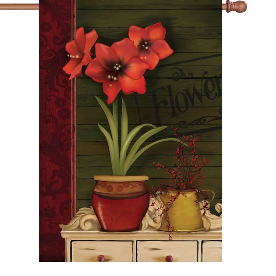 28 in. Amaryllis flag with colorful floral design, displayed outside in an autumn garden setting, enhancing seasonal outdoor decor.