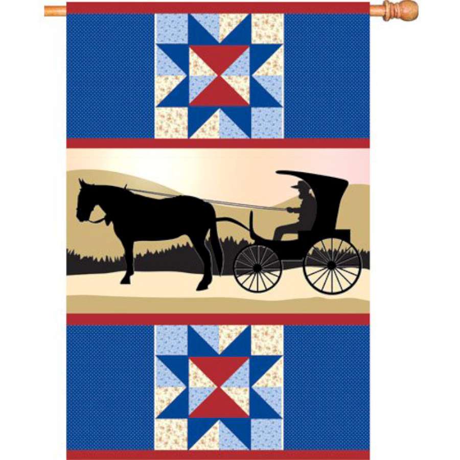 28 in. Amish Country house flag featuring vibrant designs and colors displayed on a flagpole in an outdoor garden setting.