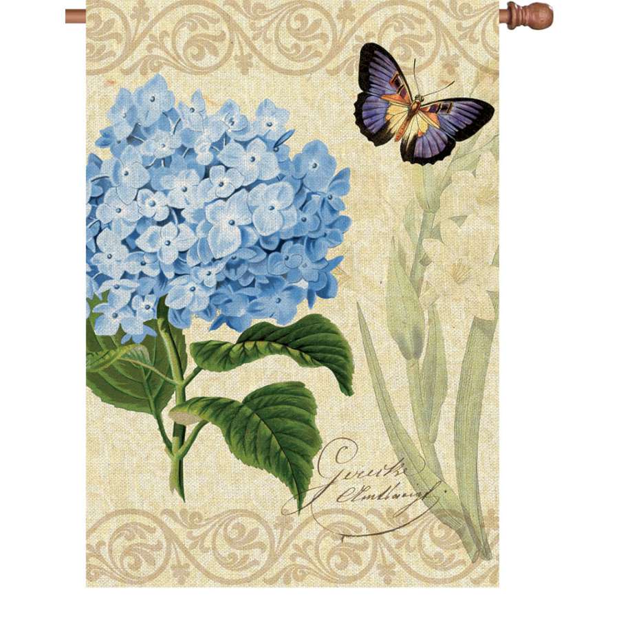 28 in. Botanical Fresh Blue flag featuring vibrant flower designs displayed outdoors on a flagpole, showcasing its illuminated feature.