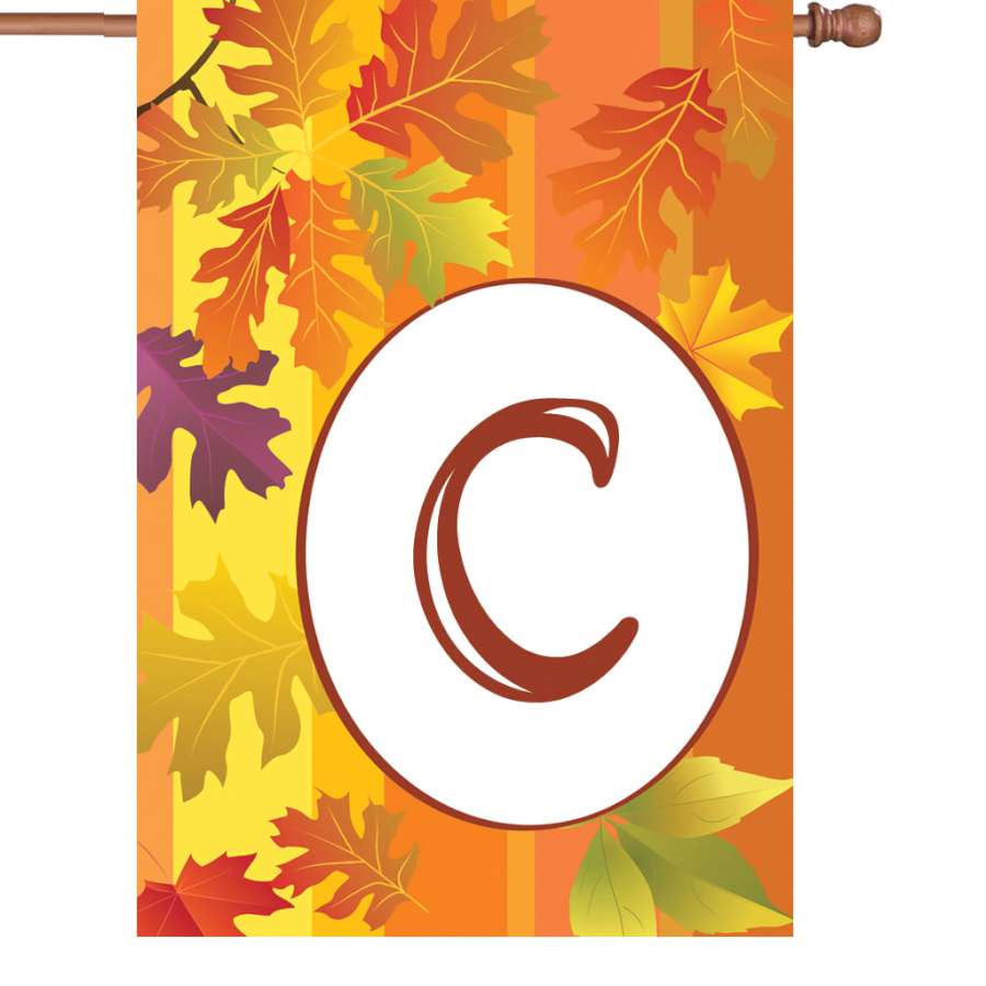 28 in. Fall Monogram Flag - C decorated with vibrant autumn colors and family monogram displayed on an outdoor flagpole.