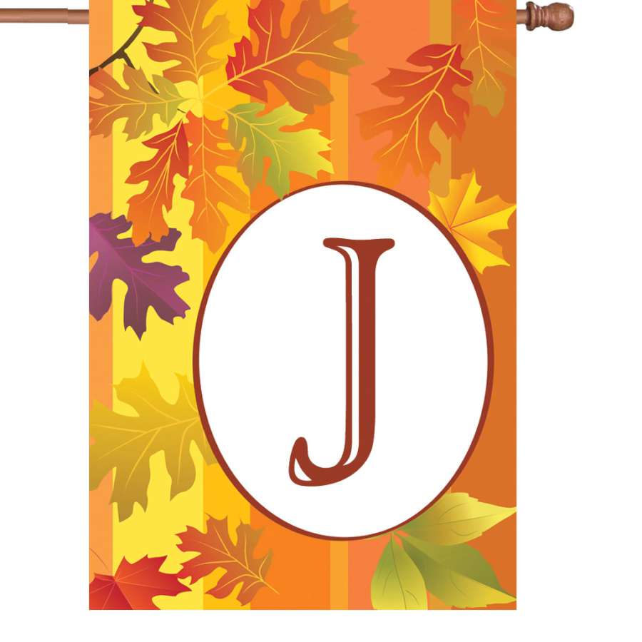 28 in. Fall Monogram Flag - J featuring a custom monogram and autumn-themed decorations displayed on a flagpole in a vibrant outdoor setting.