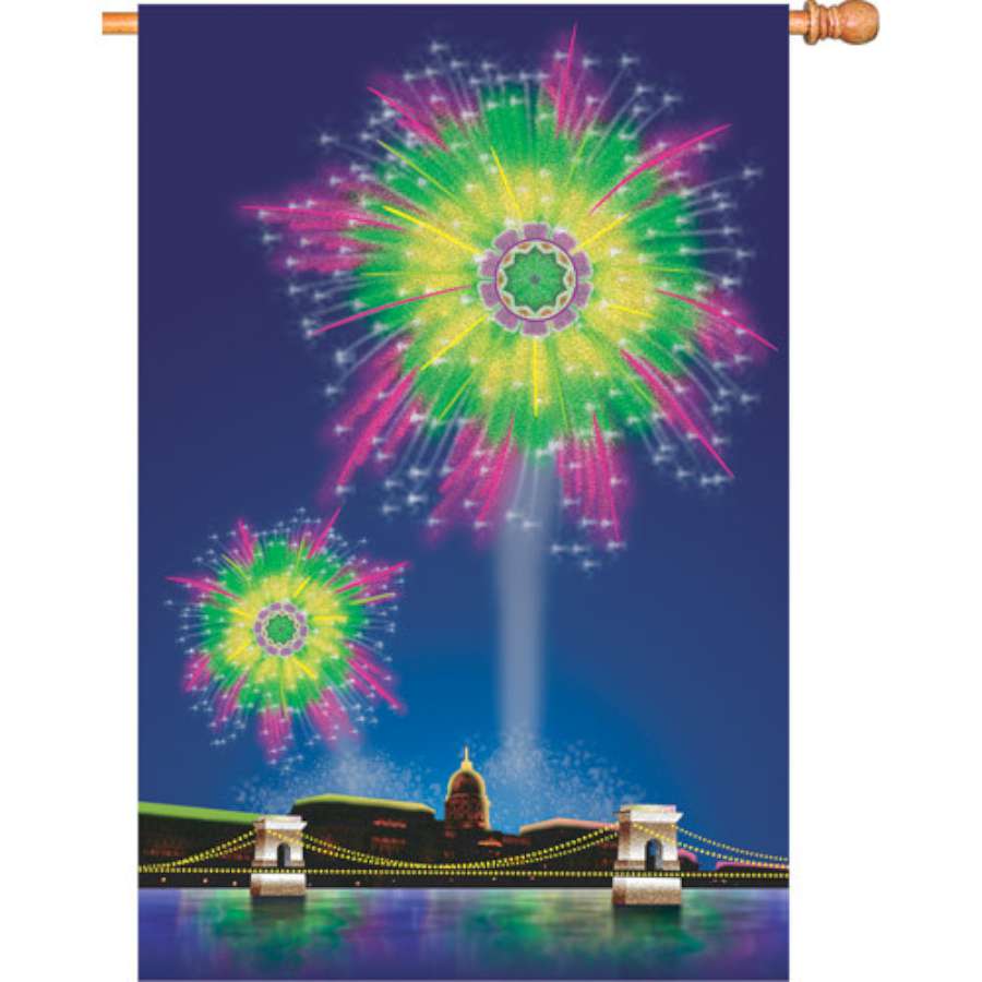 28 in. Firework Fantasy house flag featuring colorful fireworks displayed on a flagpole in a garden setting, celebrating outdoor fun.