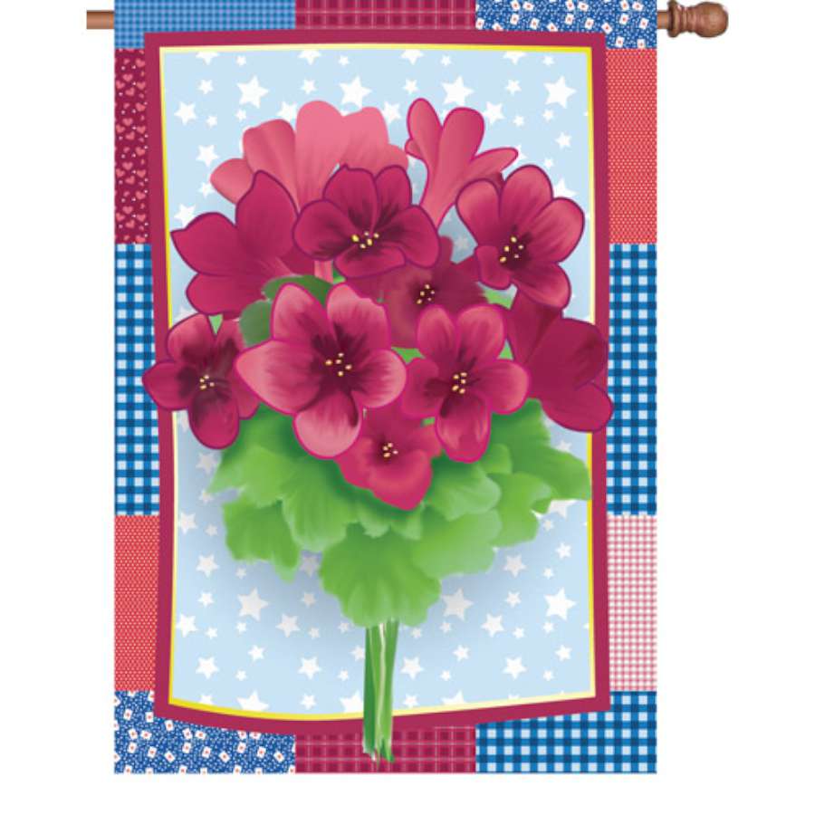 28 in. Flag - Country Geraniums featuring bright geranium blooms against a crisp backdrop shown flying on a flagpole in a vibrant garden setting.