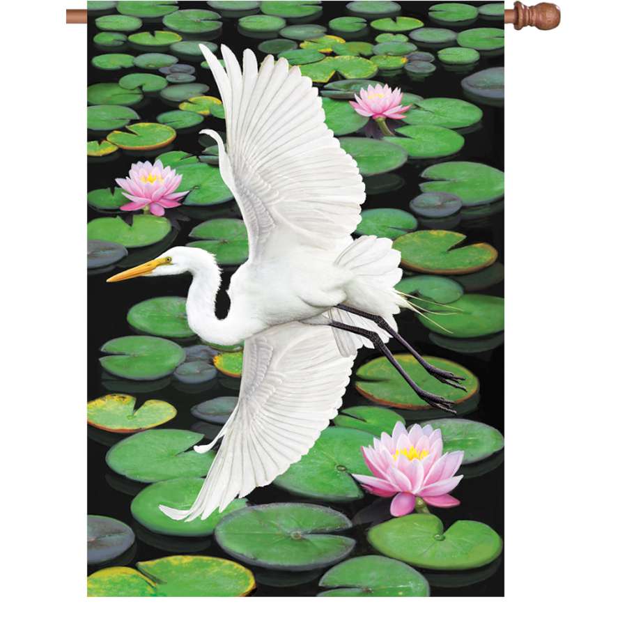 Illuminated 28 in. Egret Elegance flag showcased in a vibrant garden setting, highlighting its charming design and colors.
