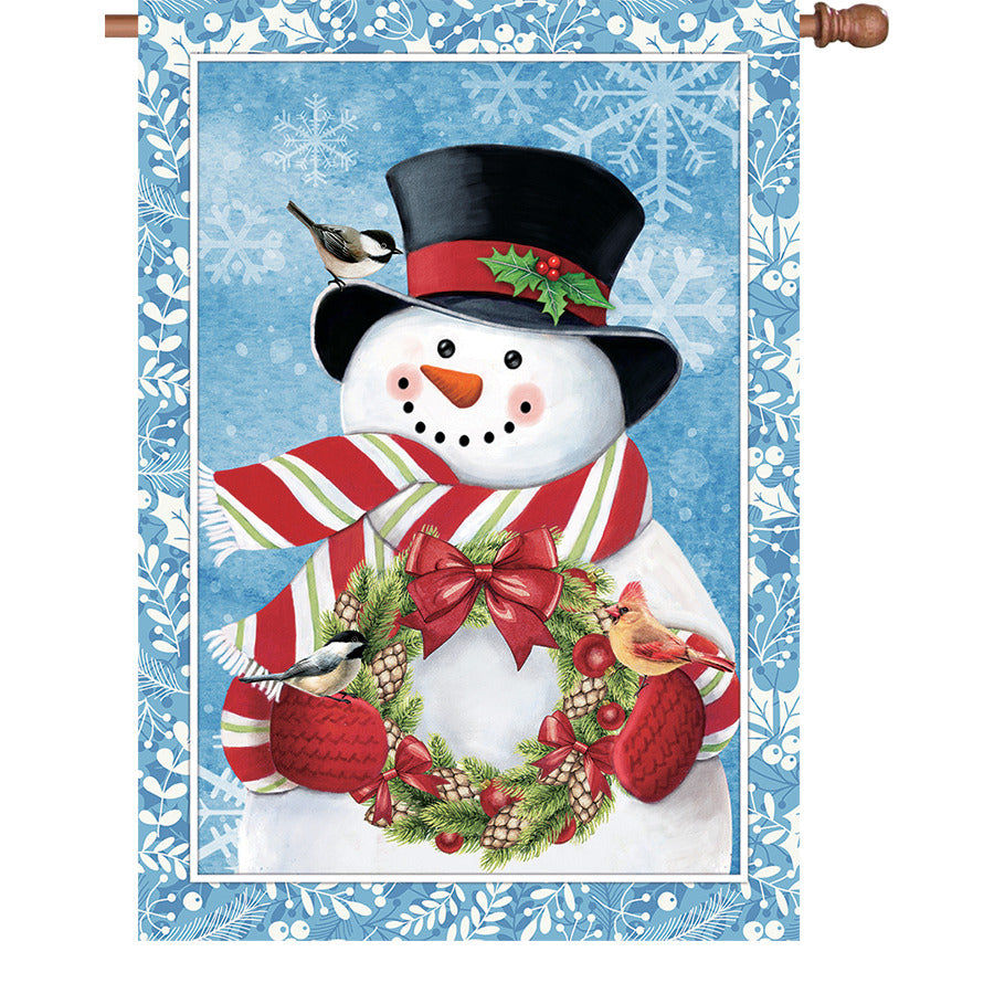 28 in. Flag Snowman Wreath illuminated flag featuring a cheerful snowman design displayed outside, vibrant colors ideal for winter decor.