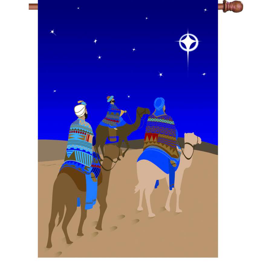 28 inch house flag featuring the Three Wisemen design, showcasing vibrant colors in a winter holiday setting displayed outdoors.