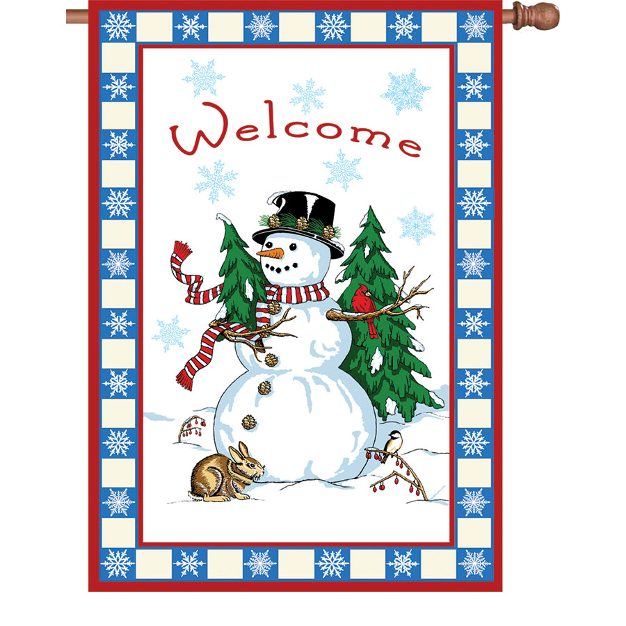 28 in. Flag - Welcome Snowman with cheerful snowman and Christmas tree design, displayed outdoors in winter decor, showcasing double-sided richness.