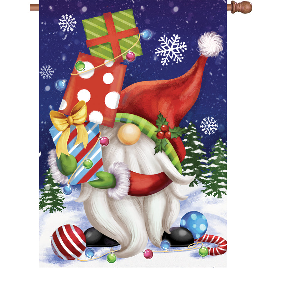 28 in. illuminated flag with whimsical gnome design displayed on a flagpole in a winter garden setting, bright colors glowing at night.