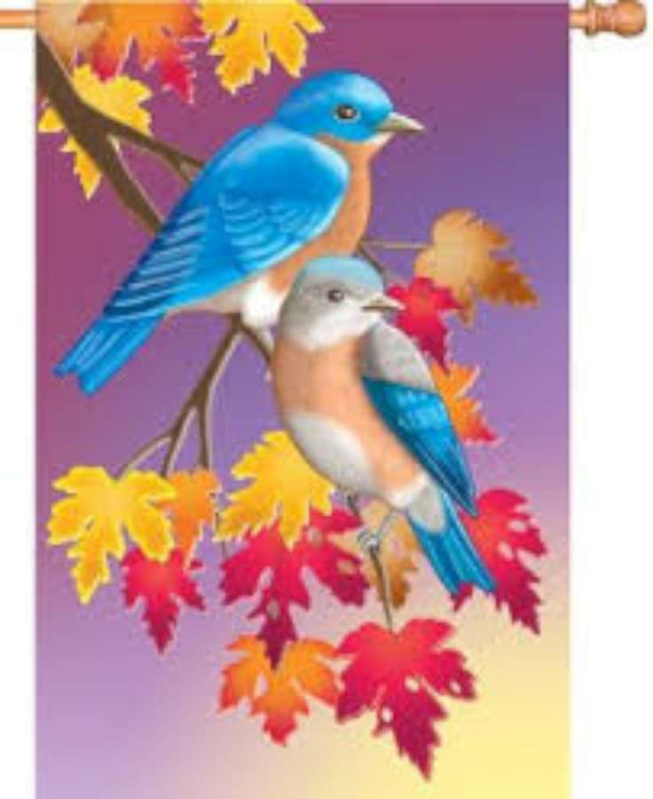 28 in. Prelude in Blue house flag designed with vibrant blue hues, displayed prominently in an autumn garden setting.