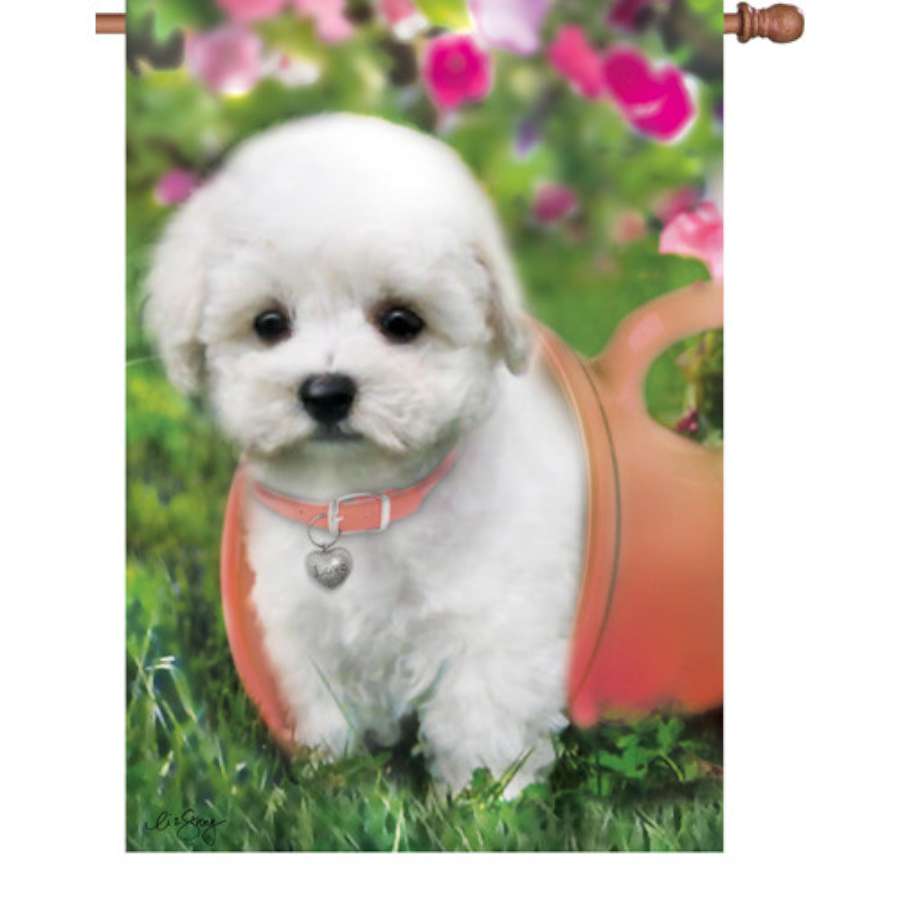 28 in. Puppy Love illuminated flag featuring an adorable puppy design on display in a vibrant garden setting.
