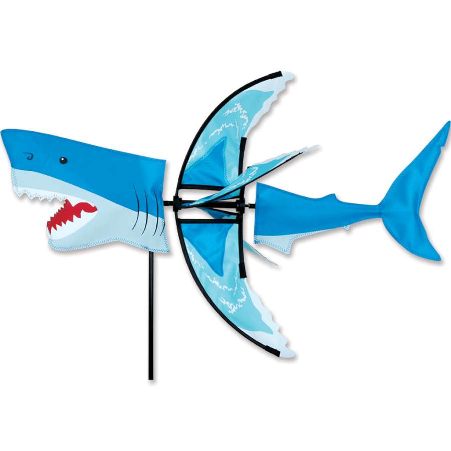 28 in. Shark Spinner stands proudly in a garden, featuring vibrant colors and playful design, rotating gracefully in the breeze.