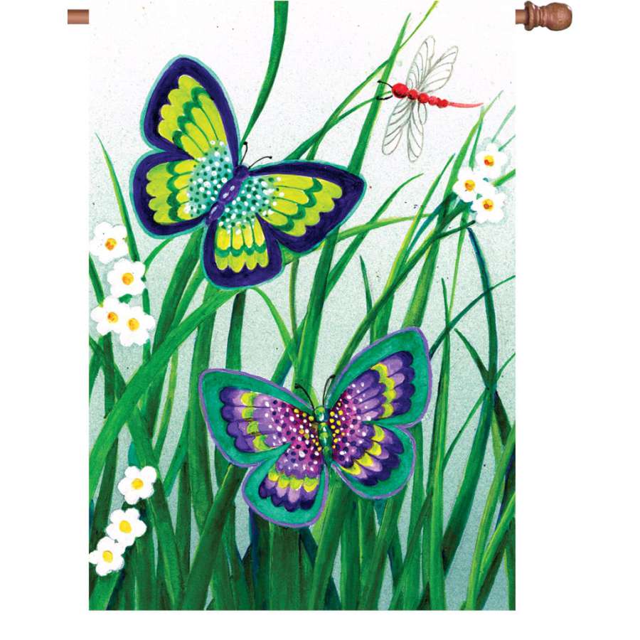 28 in. illuminated garden flag featuring vivid butterfly designs, displayed on a flagpole in a sunny garden setting.