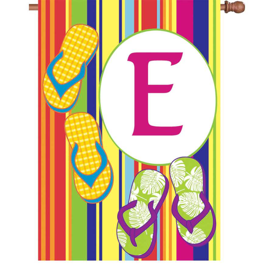 28 in. Summer Monogram Flag - E with a vibrant initial design displayed outside on a garden flag stand in full view.