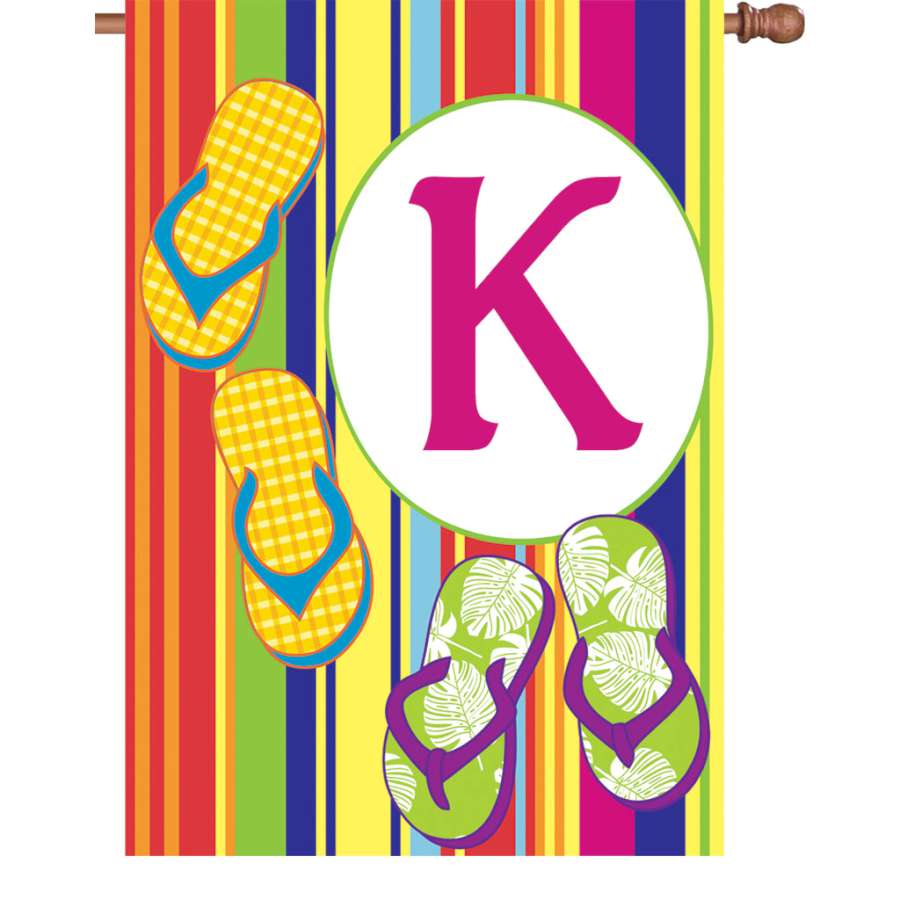 28 in. Summer Monogram Flag - K displayed outdoors, showcasing a vibrant initial on a colorful background, perfect for garden or porch decoration.