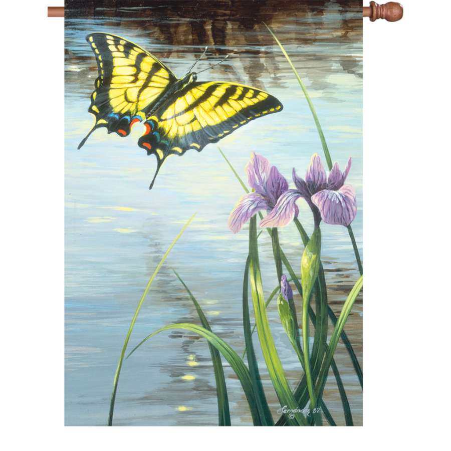 28 in. illuminated Swallowtail and Iris flag showcasing colorful butterfly design displayed in an outdoor garden setting.