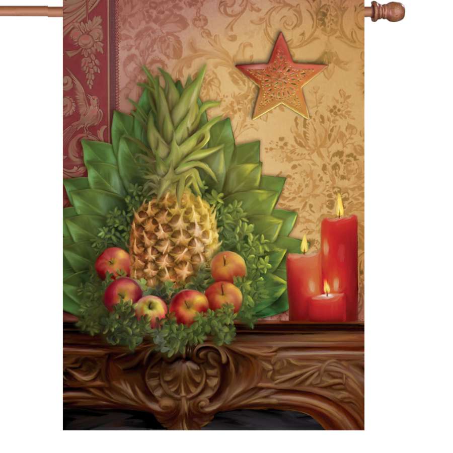 28 in. Traditional Pineapple Flag featuring a vibrant pineapple design, displayed outside on a garden flag stand in an autumn setting.