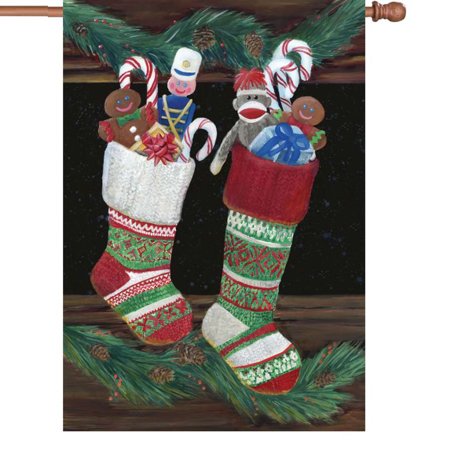 28-inch illuminated Christmas Stocking flag in vibrant colors displayed in a front yard, adding festive charm to the holiday season.