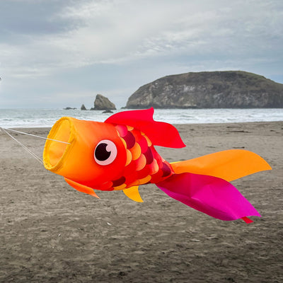 30" Hot Damsel Fish windsock in colorful design, swaying gracefully in the breeze against a sunny outdoor backdrop.