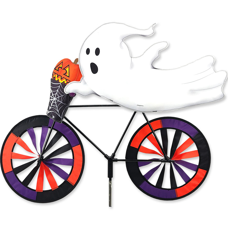 30 in. Bike Spinner in Ghost design, colorful and vibrant, spinning gently in the outdoor breeze against a bright sky background.