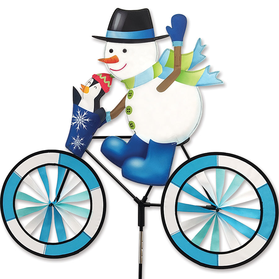 30 in. Bike Spinner - Snowman with colorful six-panel fabric rim spinning in a garden, displaying a whimsical snowman design.
