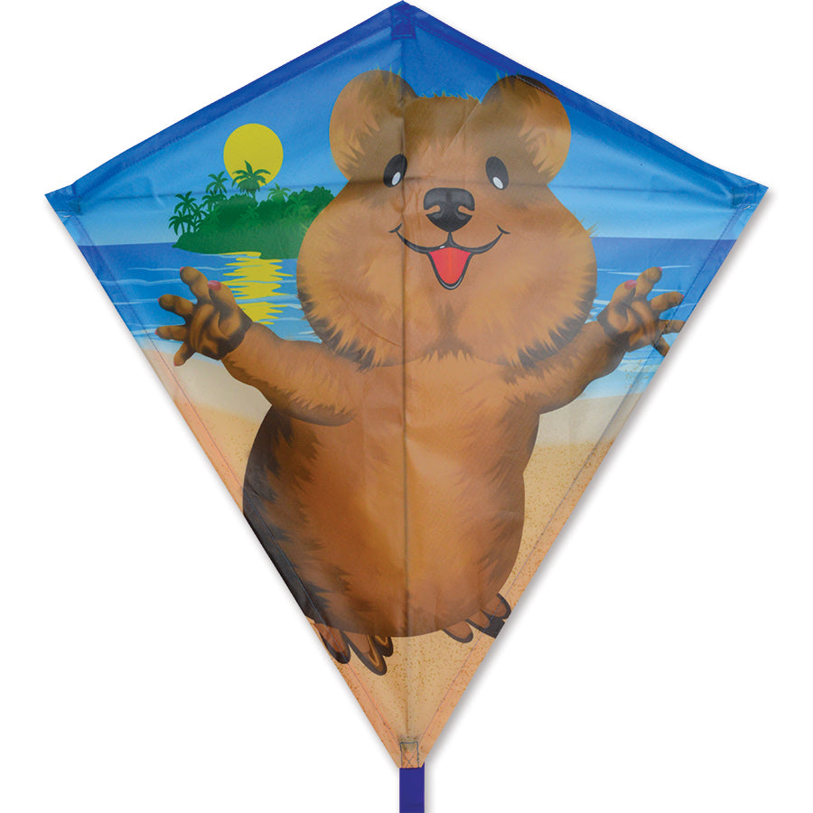30 in. Diamond Kite - Quokka displaying vibrant colors and whimsical graphics flying in a clear blue sky during a sunny day.