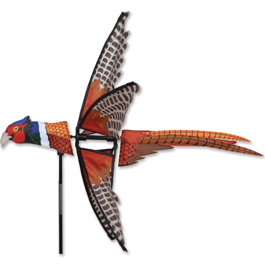 Vibrant 30 in. Pheasant Spinner gently rotating in the wind, showcasing the colorful, intricately detailed design against a lush garden backdrop.