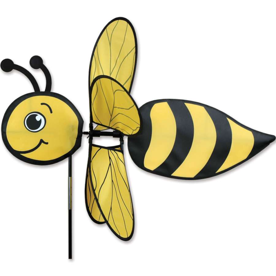 31 in. Flying Bee Spinner displaying colorful design and motion in a garden setting with flowers in the background.