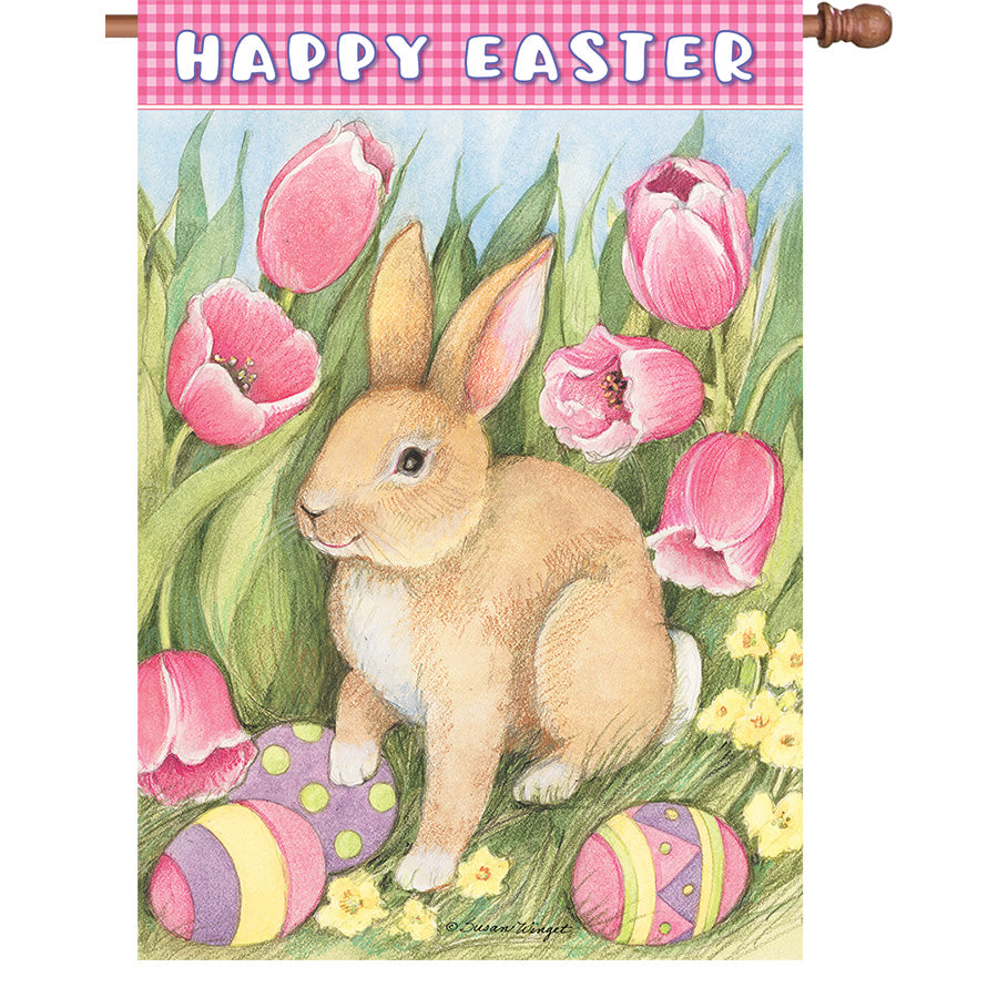 36 in. Elite Oversized House Flag showing Easter Bunny surrounded by tulips, waving gently in a spring breeze on a garden flag pole.
