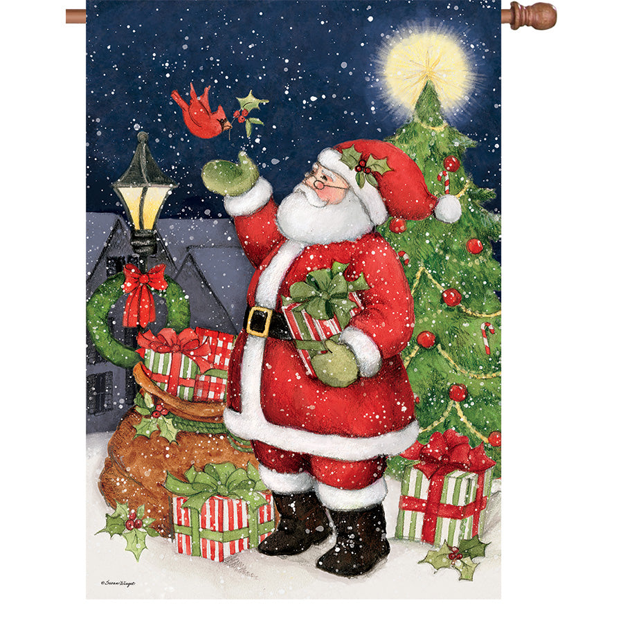 36 in. Elite Oversized House Flag with Santa and Cardinals design, displayed elegantly outdoors on a flagpole in a festive winter setting.