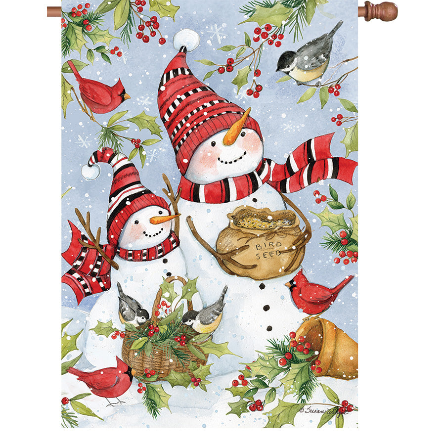36 in. Elite Oversized House Flag featuring Snowmen Feeding Birds design, displayed on a standard pole with winter scenery in the background.