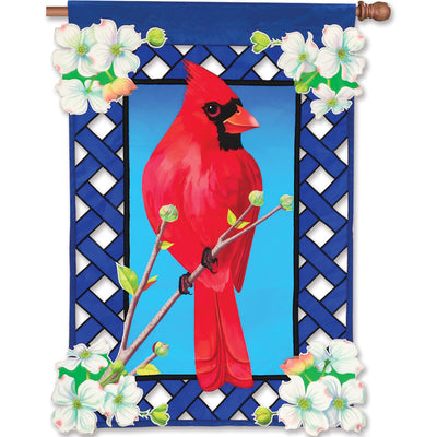 36 in. Elite Oversized Lattice Flag featuring cardinal and dogwood design, displayed on a flag pole in a lively garden setting.