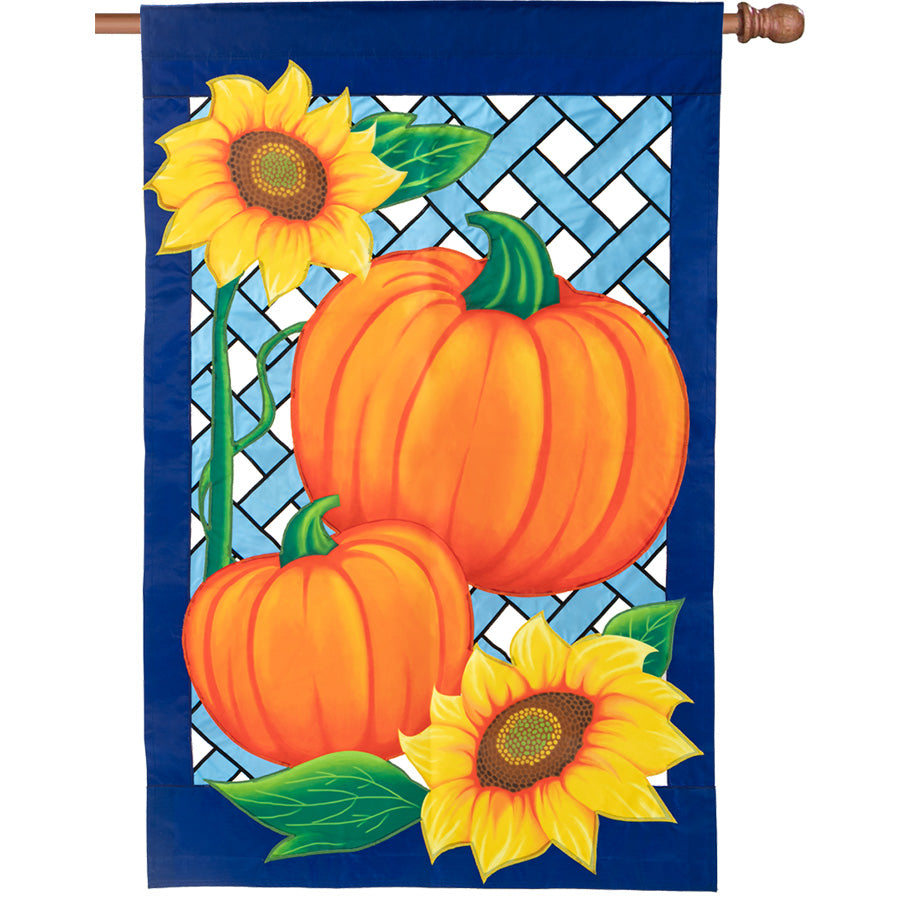 36 in. Elite Oversized Lattice Flag featuring a vibrant harvest pumpkin design, displayed prominently on a flag pole against an autumn backdrop.