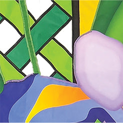 36 in. Elite Oversized Lattice Flag displaying a vibrant iris design, elegantly fluttering on a flag pole in a garden setting.