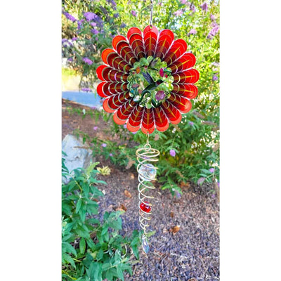 3D Hummingbird wind spinner featuring vivid colors and sparkling crystal twister, beautifully displayed spinning in a garden setting.