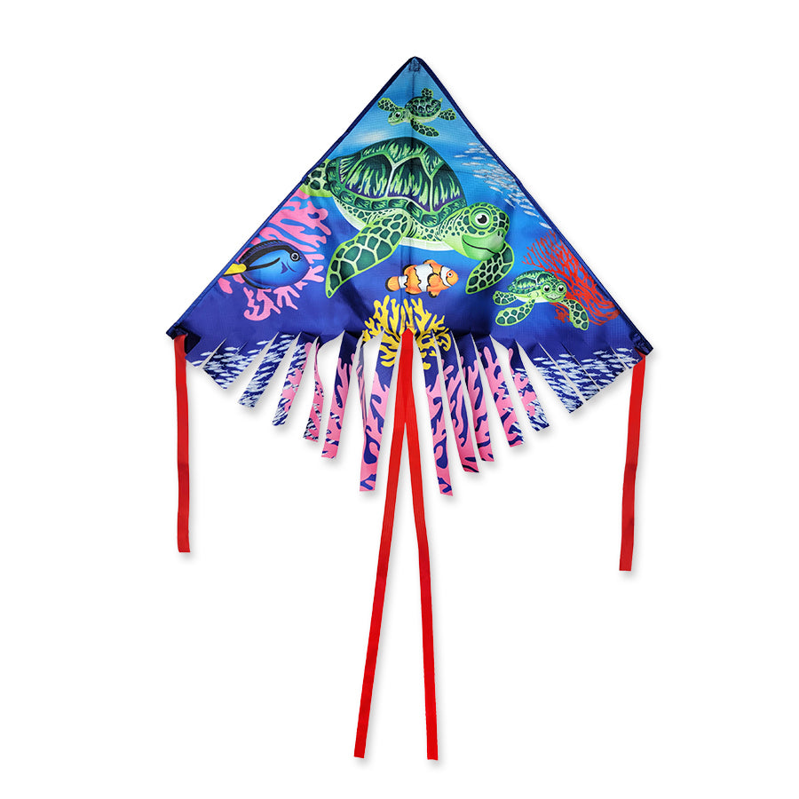 42 in. Fringe Delta Kite featuring a colorful sea turtle design flying in the sky during a sunny outdoor day.