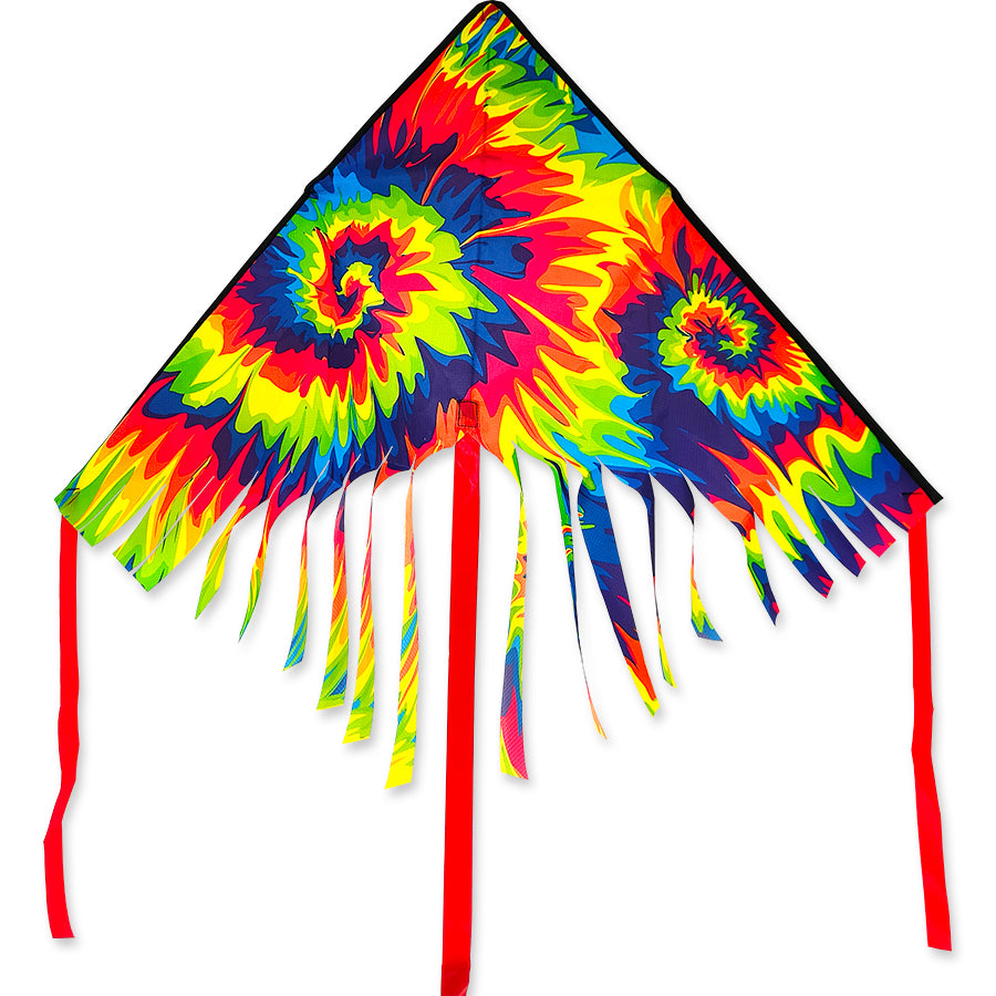 Colorful 42 in. Fringe Delta Kite in tie-dye design soaring against a blue sky with vibrant streamer tails, ideal for outdoor flying activities.