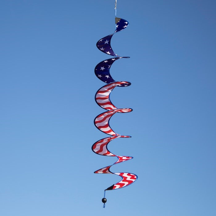 48-inch Stars and Stripes Curlie featuring red, white, and blue graphic dancing in the breeze as a decorative outdoor hanging piece.